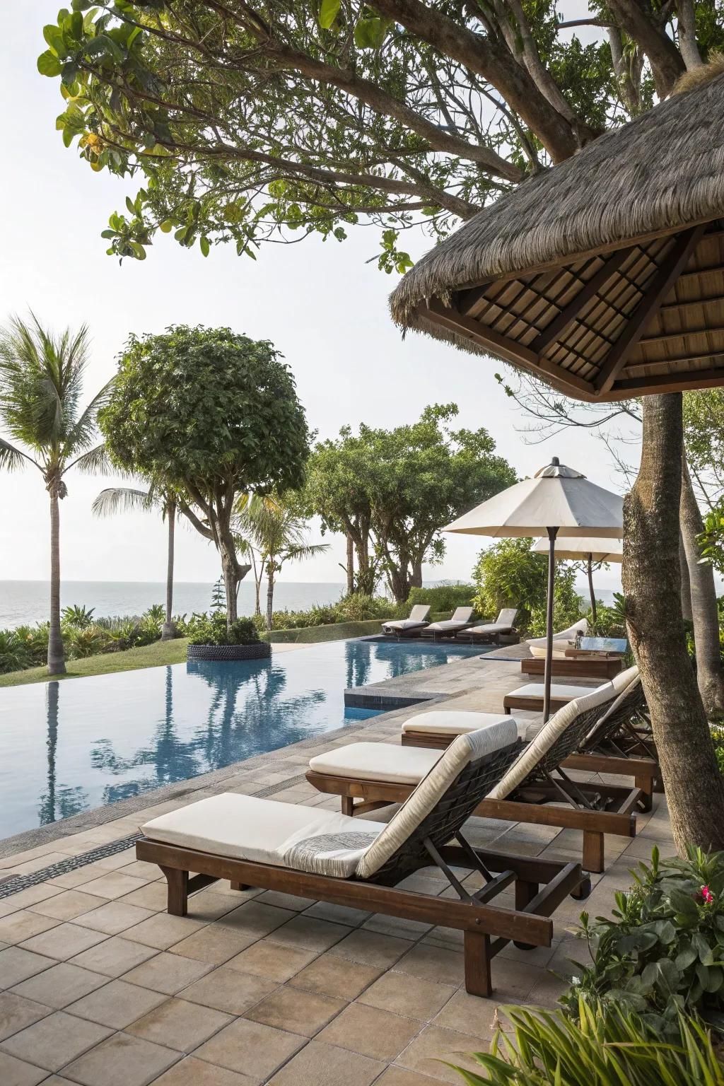 Cozy lounging areas invite guests to unwind by the pool.