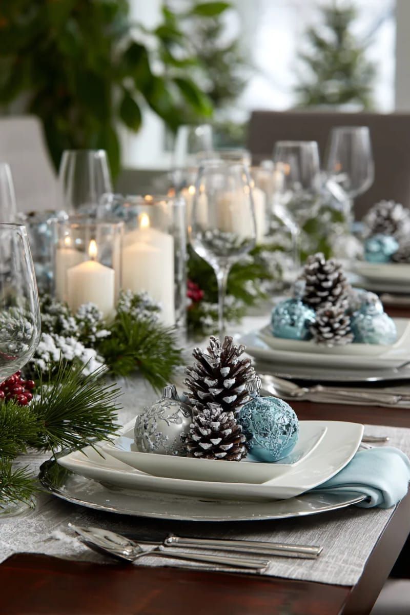 blue and silver baubles with frosted pinecones for a wintry vibe 1