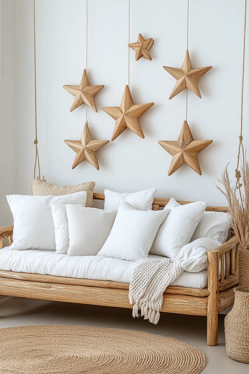 natural wood stars hanging above a bed or sofa 1