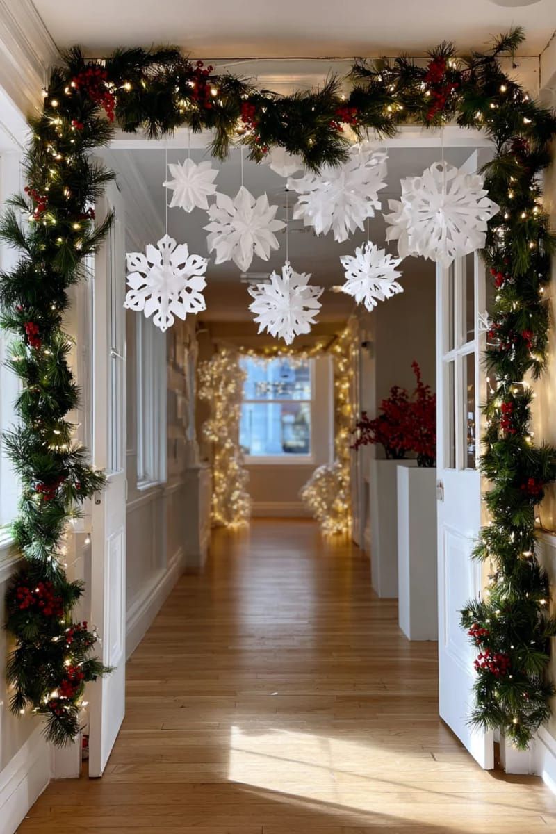 hanging snowflake mobiles above entryway for an enchanting winter wonderland entrance 1