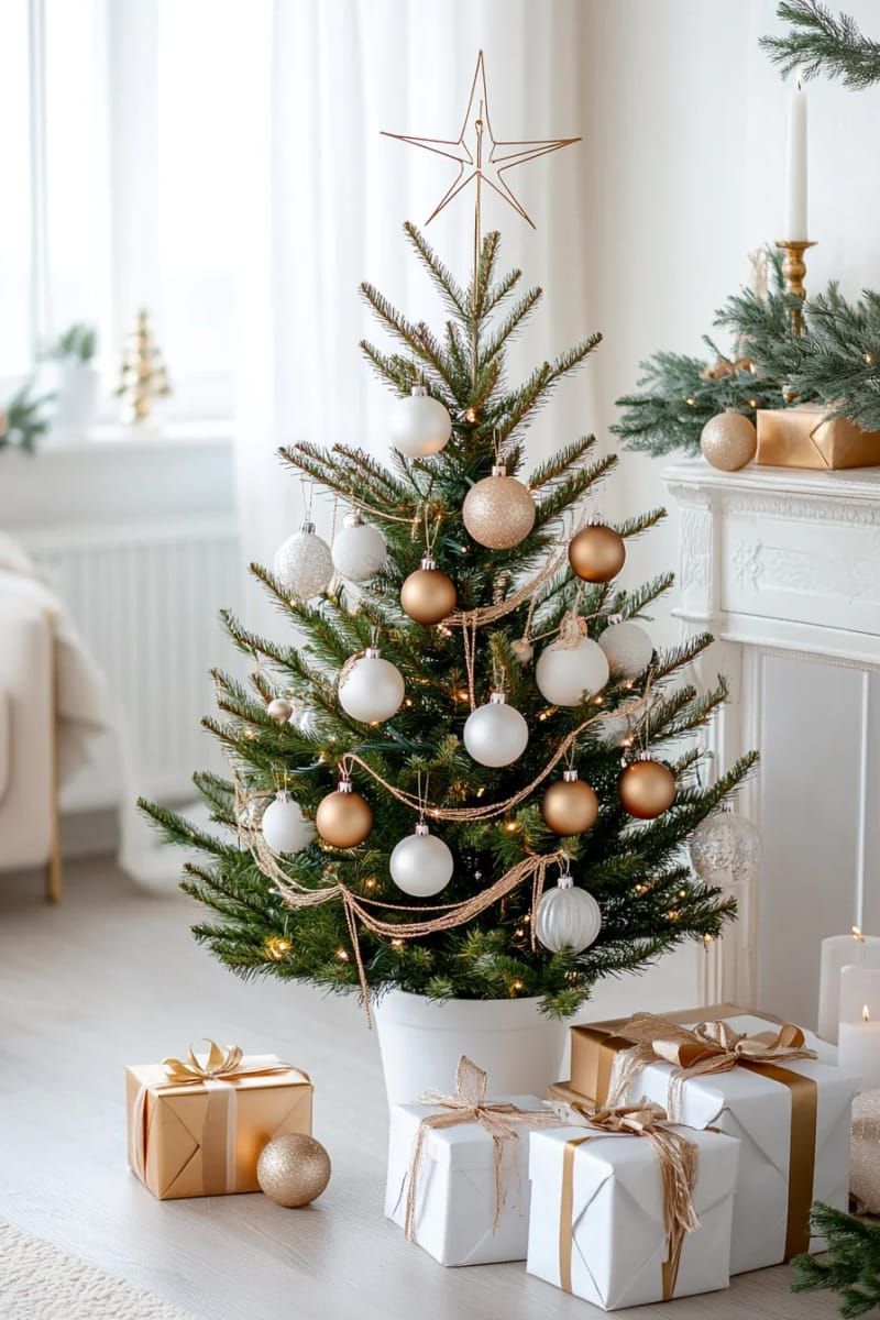 minimalist white and gold tree with delicate glass ornaments 1