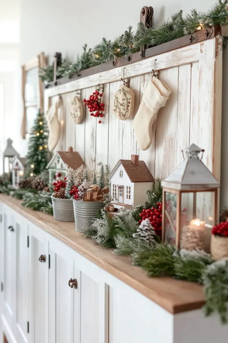 repurposed barn door backdrop for a christmas village display 1