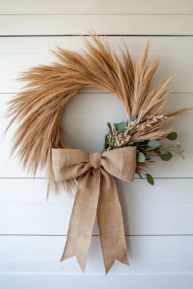 wreath of dried pampas grass with a burlap bow 1