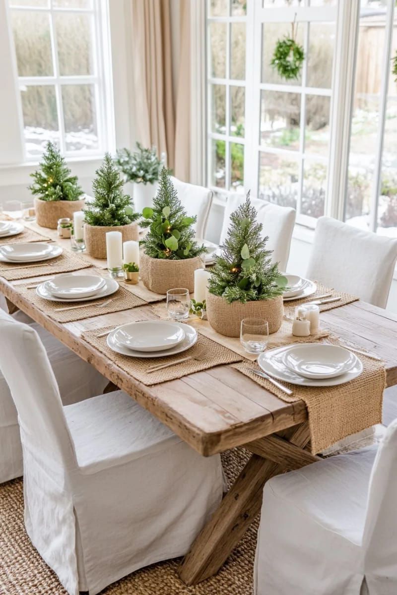 small fir trees in burlap-wrapped pots for the dining table 1