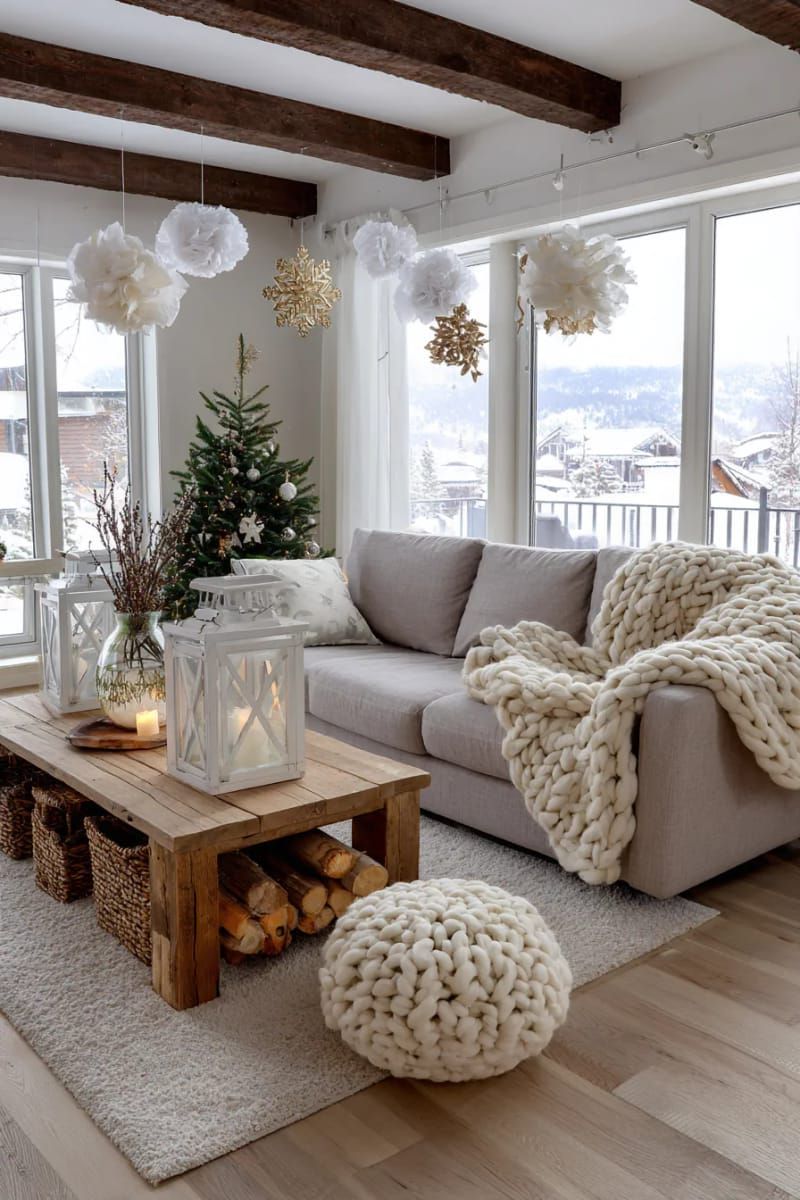scandinavian-style living room with chunky knit throws and white lanterns 1