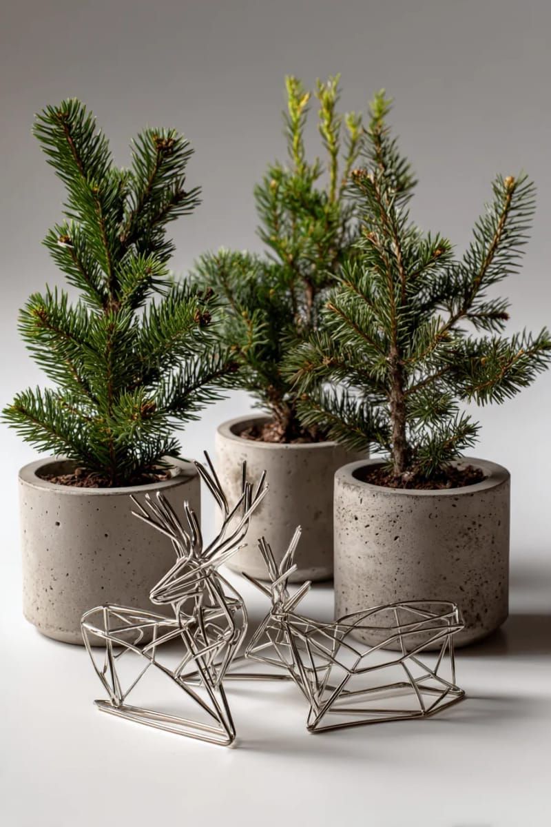 abstract wire-frame reindeer paired with potted evergreens in concrete planters 1