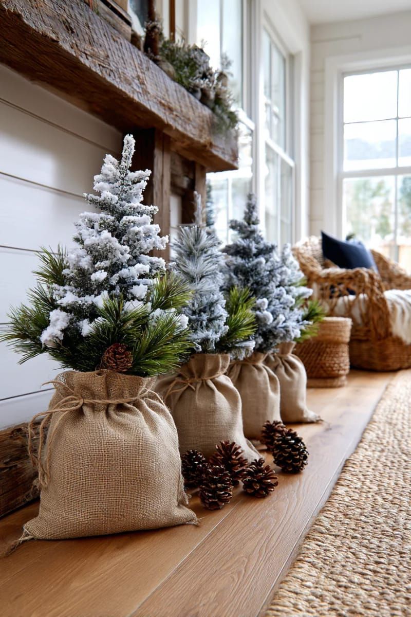 mini snowy flocked trees in burlap sacks for a farmhouse corner 1