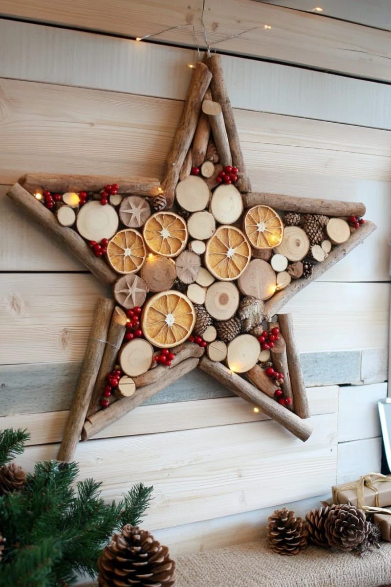 star-shaped wall art made from dried orange slices and cinnamon sticks 1
