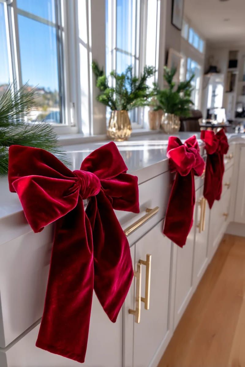 red velvet bows tied to cabinet handles and window locks 1