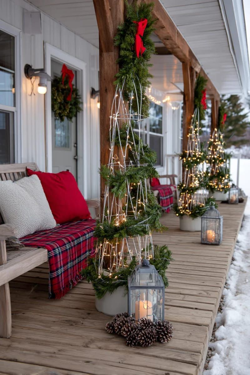 tomato cage christmas trees wrapped in garland and twinkle lights for cozy corners. 1