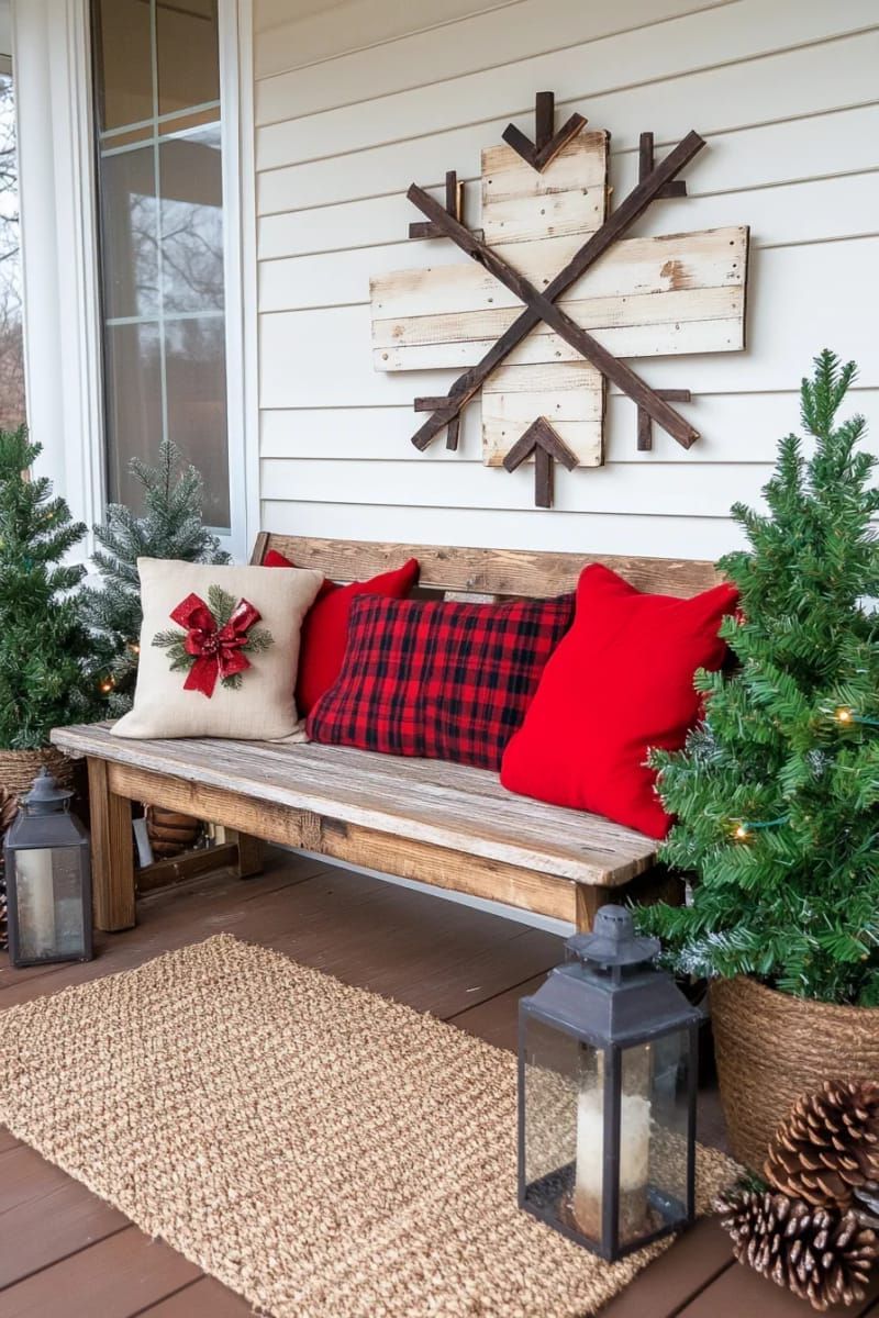 snowflake wall art crafted from white-painted popsicle sticks and glitter accents. 1