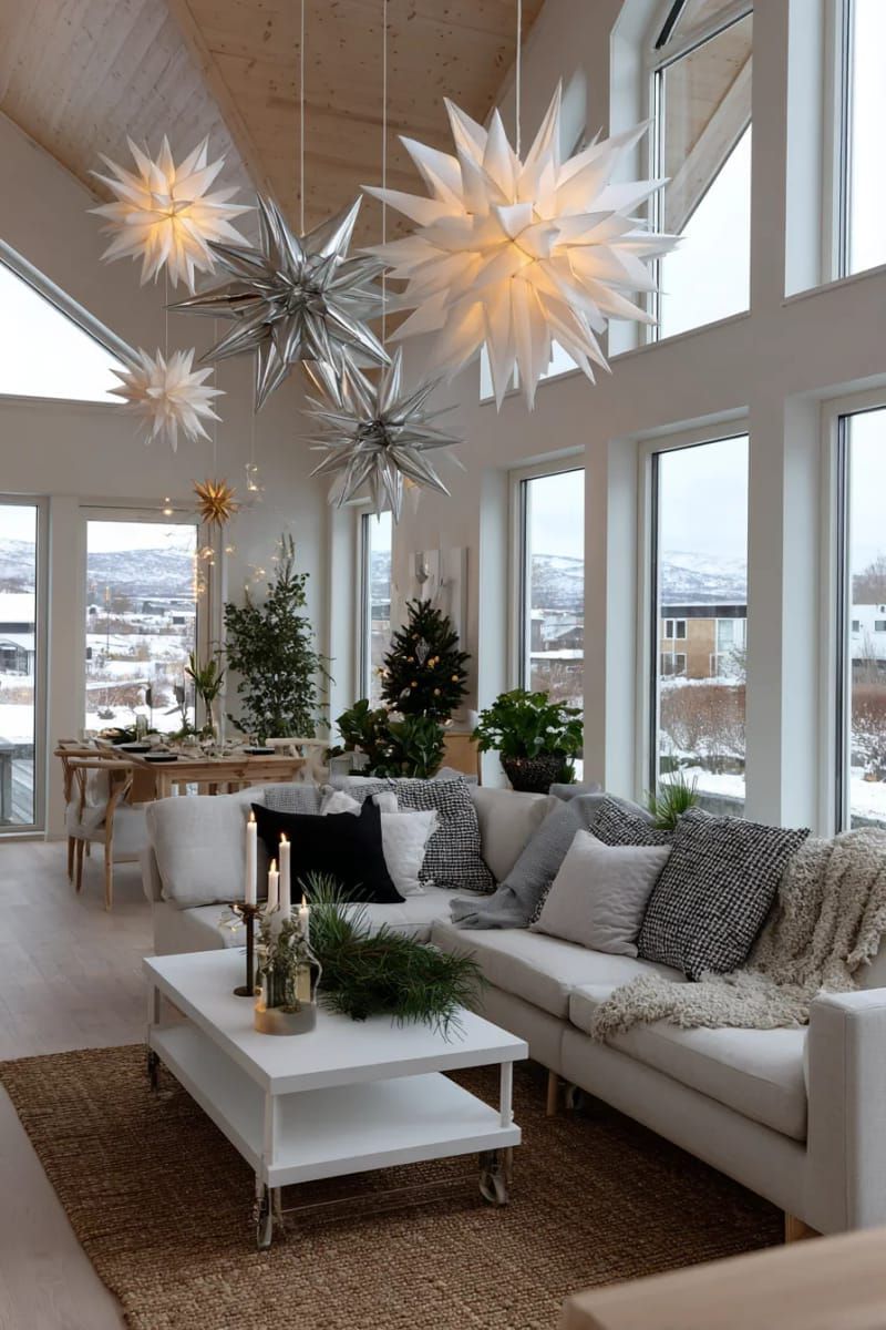 giant geometric paper stars suspended from the ceiling for modern flair 1