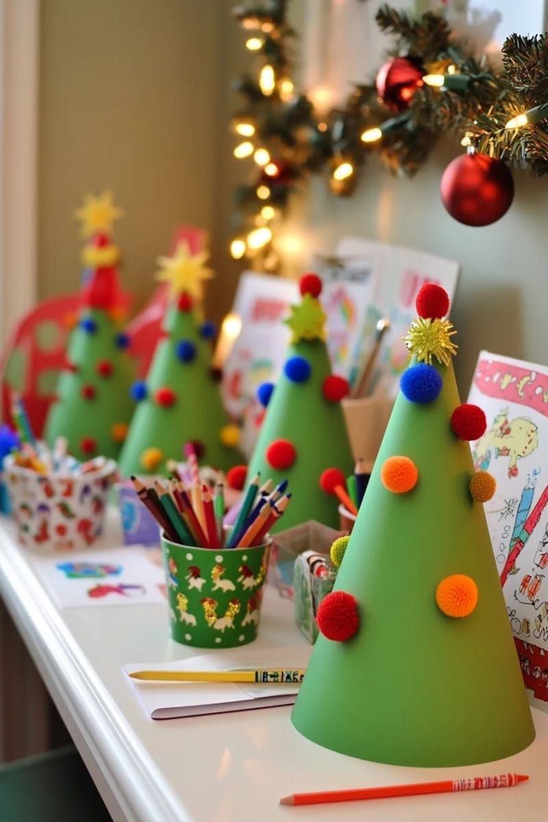 3d cone trees made from green cardboard and pom-poms, displayed on kids’ desks 1