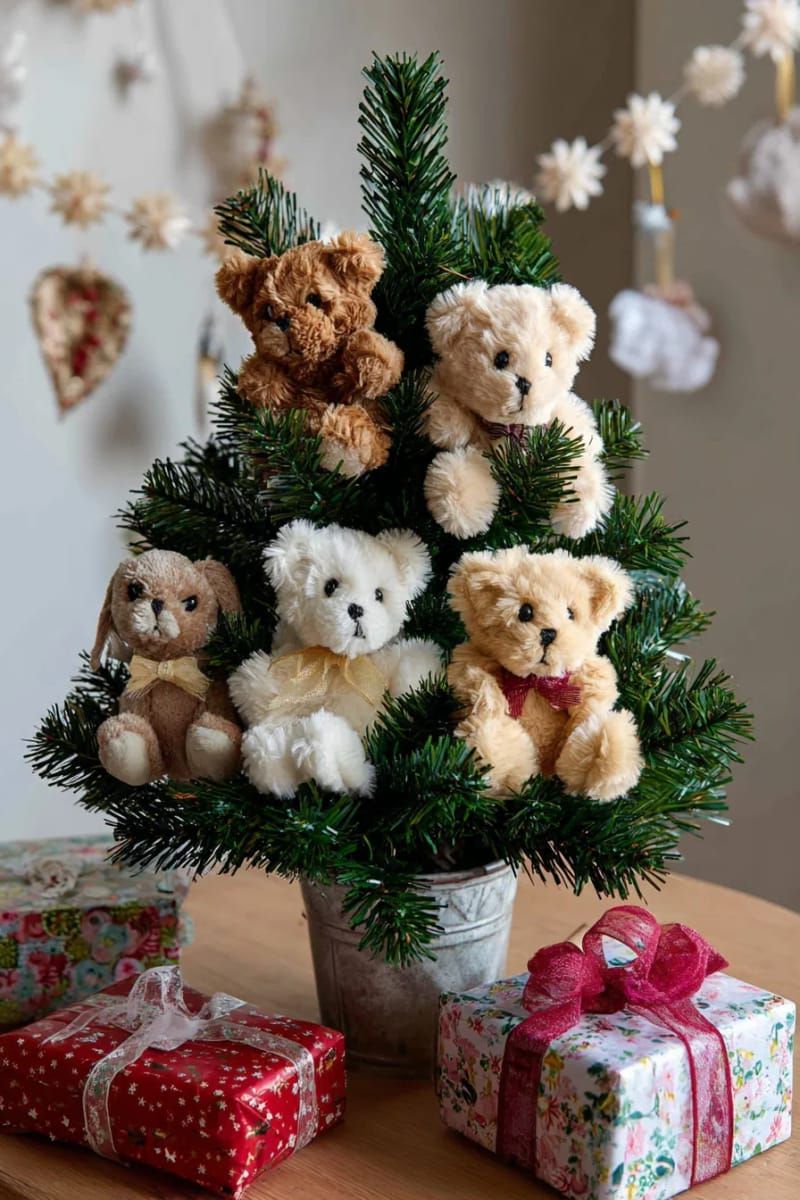 classic plush animal ornaments hugging the branches of a small child-safe tree 1