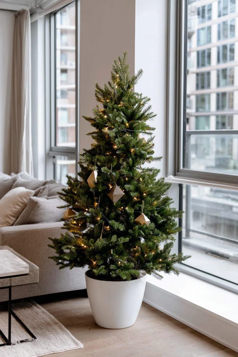 modern minimalist tree with only white fairy lights and geometric ornaments 1