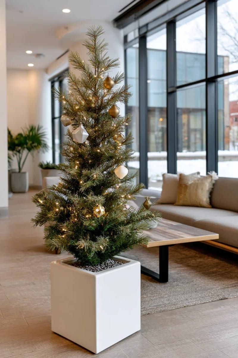 modern minimalist tree with only white fairy lights and geometric ornaments 1