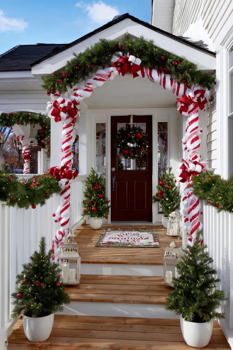 oversized candy cane archway framing your entry for a classic holiday statement 1