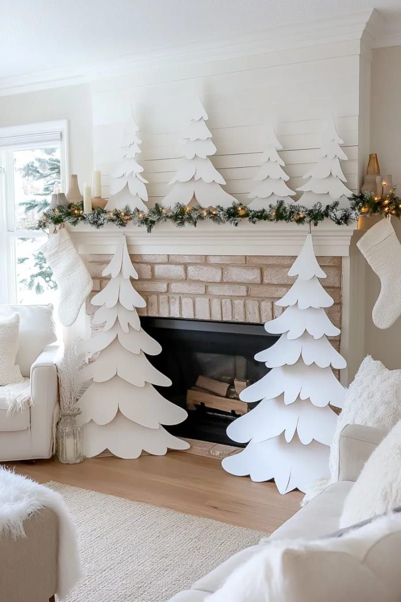 cardboard christmas tree cutouts painted white and layered for 3d effect 1